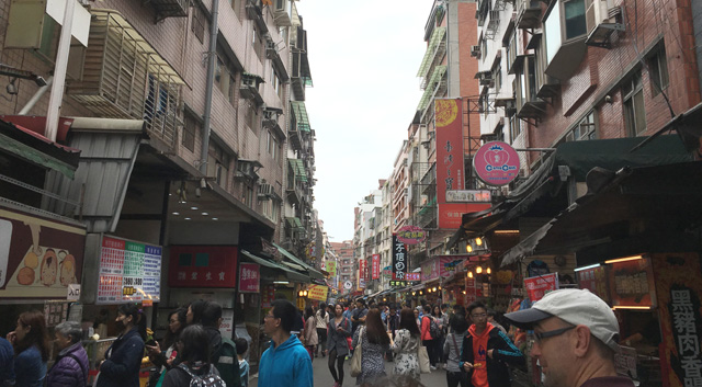 Walking down the old street in Tamsui in Taipei