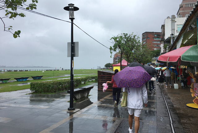 Walking in Tamsui near the water in Taipei