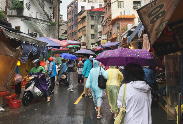Walking through the wet market in Tamsui in Taipei