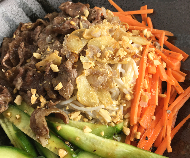 Close-up of Savory Vietnamese Beef Vermicelli in a black bowl