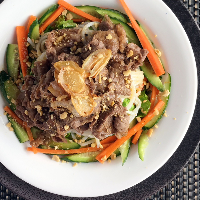 A round white dish containing Savory Vietnamese Beef Vermicelli