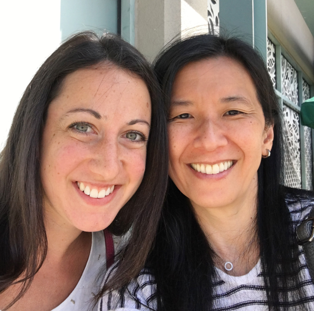 A Caucasian woman and an Asian woman, meeting food bloggers