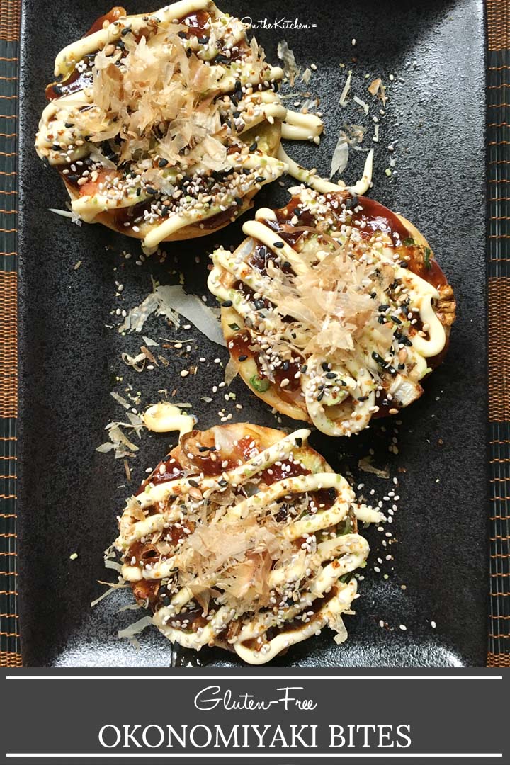 Three round muffin shapes on a black rectangular plate, the words gluten-free okonomiyaki bites on the bottom
