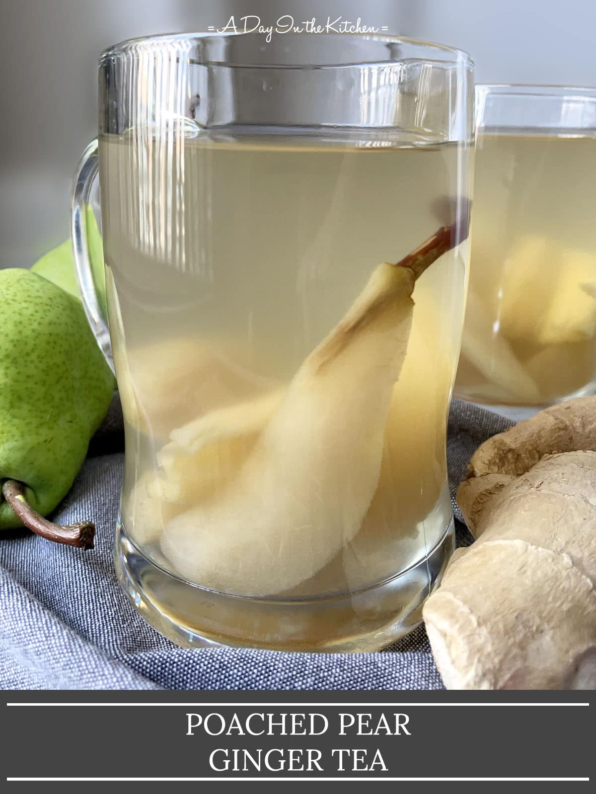 A green pear and a piece of ginger next to a glass mug containing pear wedges and ginger in a yellow liquid. The words poached pear ginger tea on the bottom.